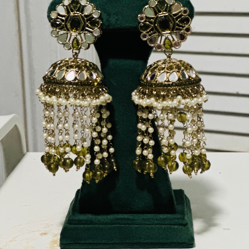 Earrings with tikk